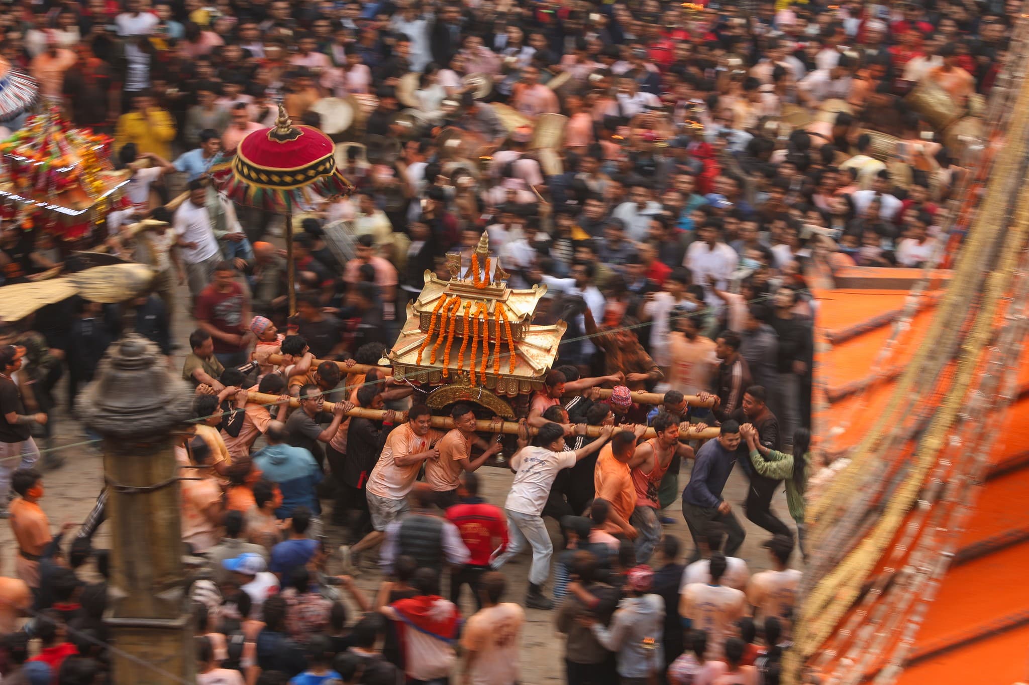 Ritual procession and crowd movement during Biska Jatra.
