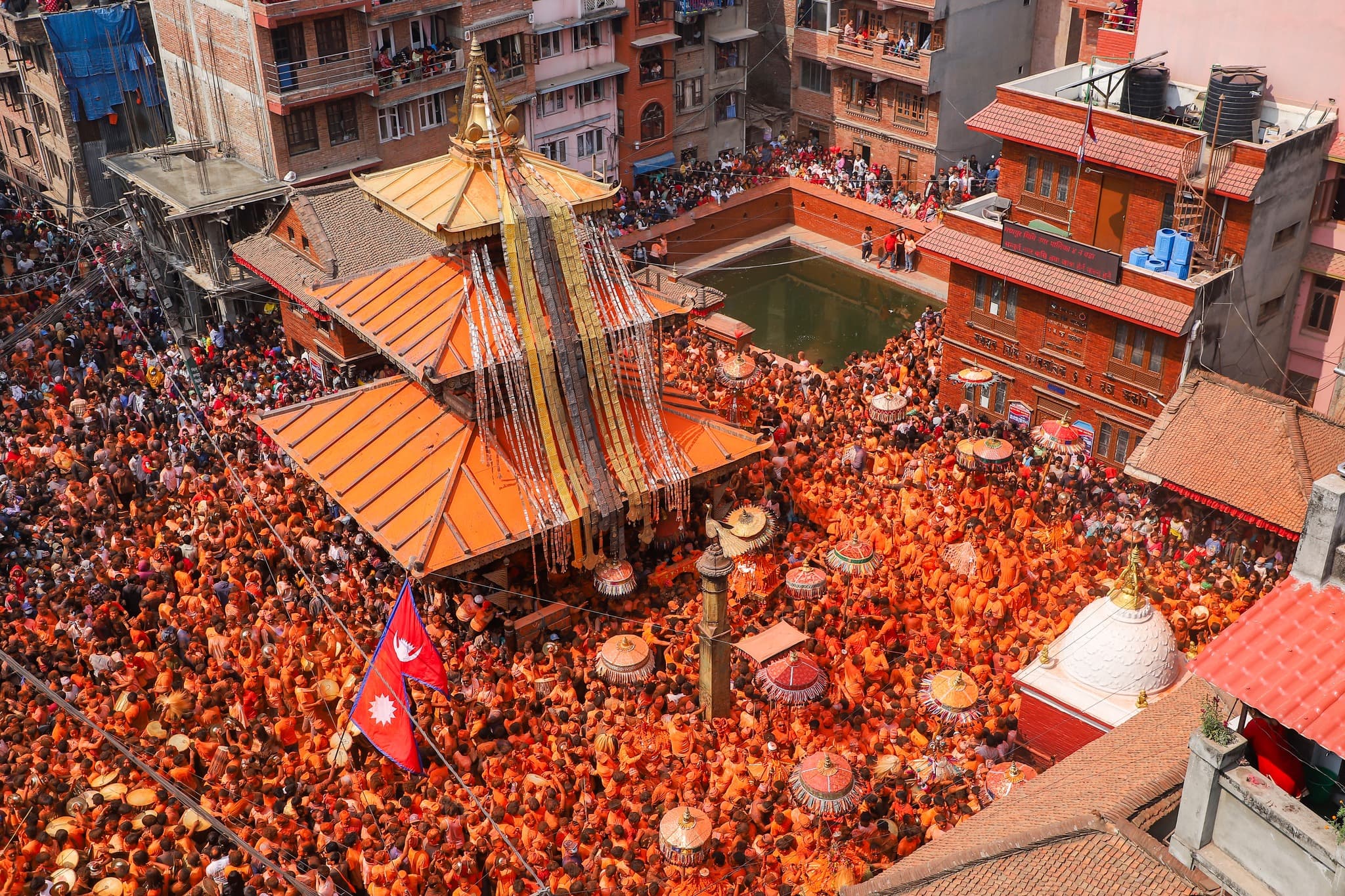 Top-view Biska Jatra crowd scene in Madhyapur Thimi for the live contest hero.
