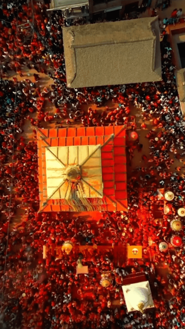 Sindoor Jatra celebration with dense communal participation.